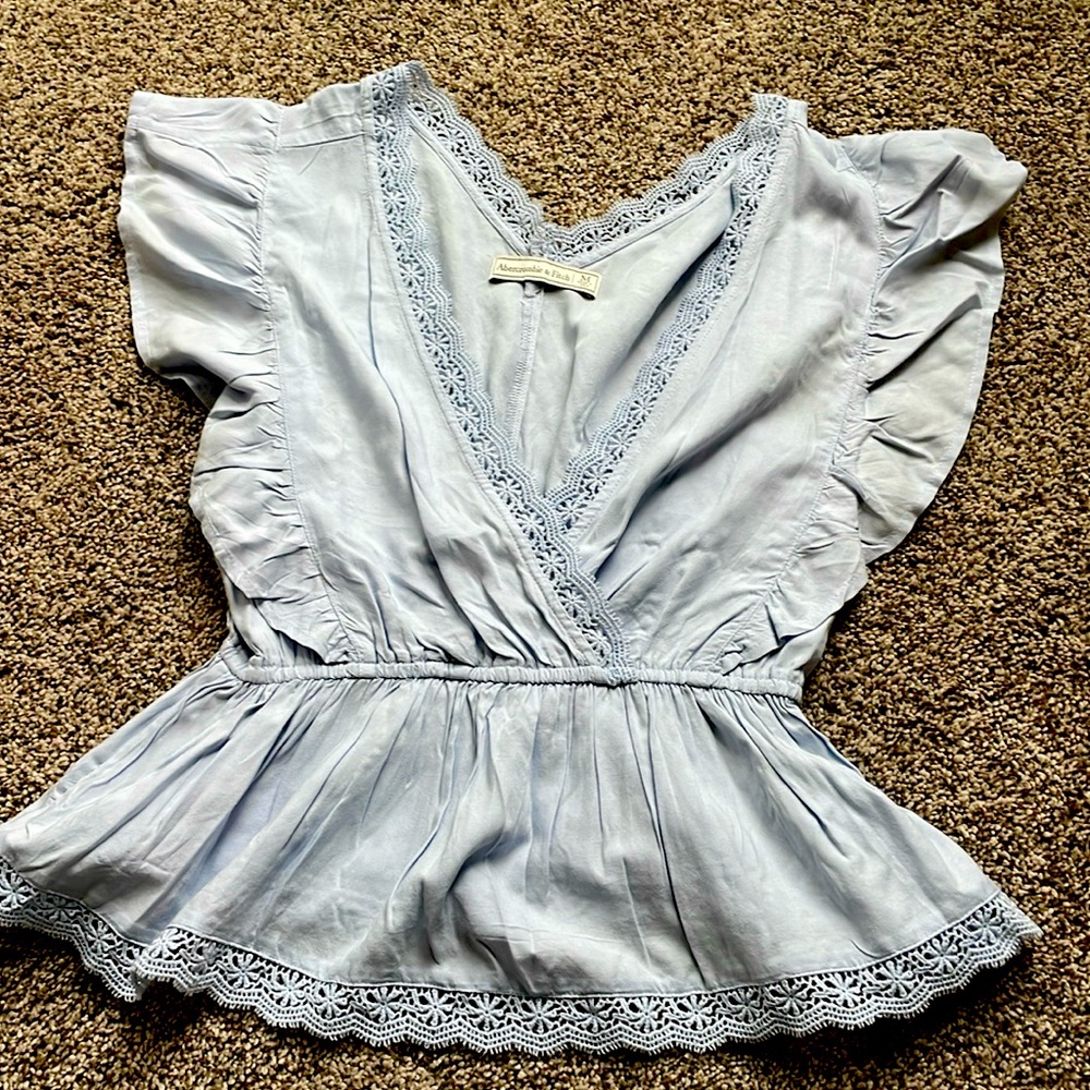 Pale blue flutter sleeve top